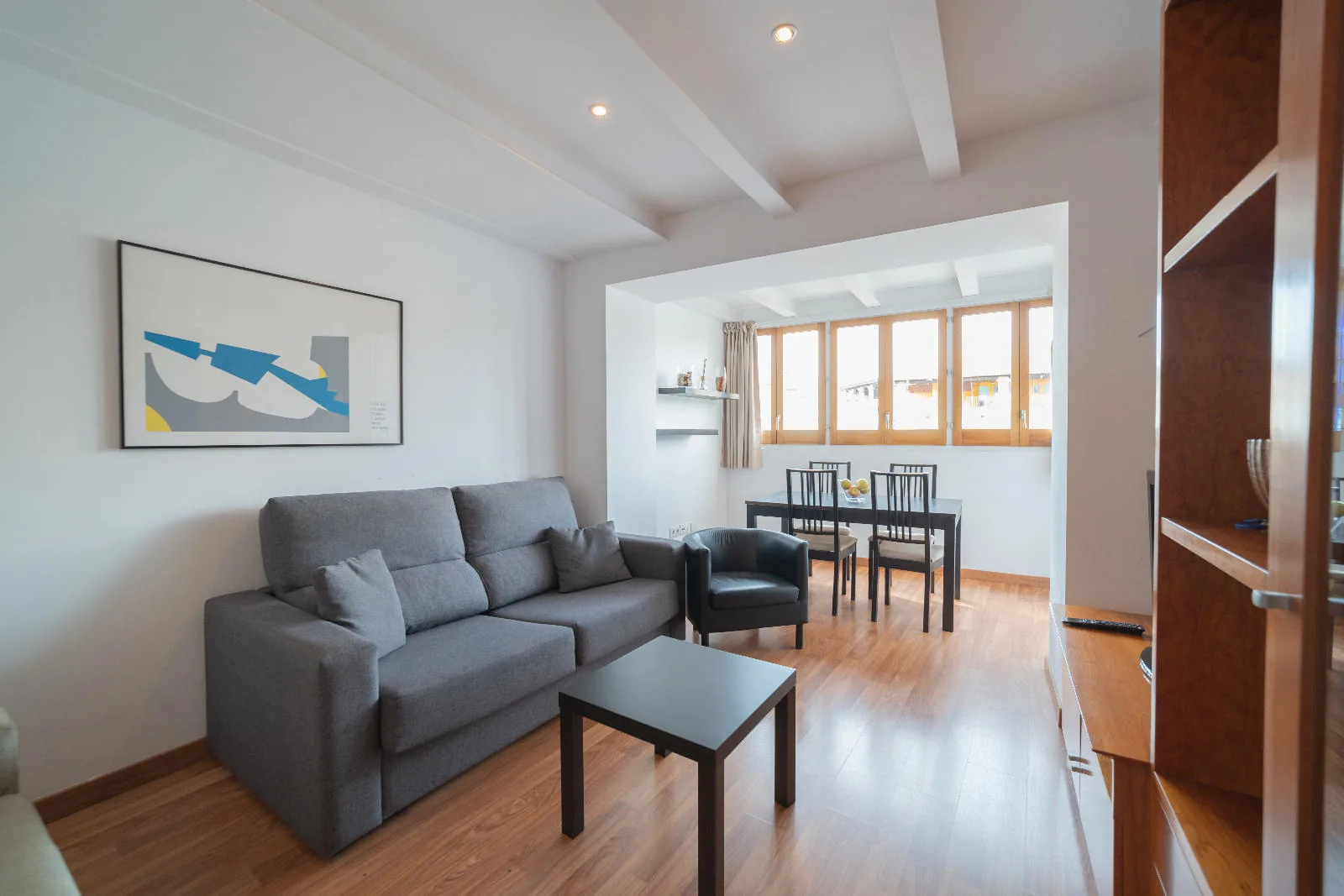 Sala d'estar i menjador de l'Apartament C d'Apartaments Girona Centre